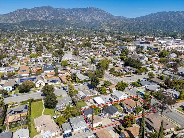 an aerial view of residential house with outdoor space