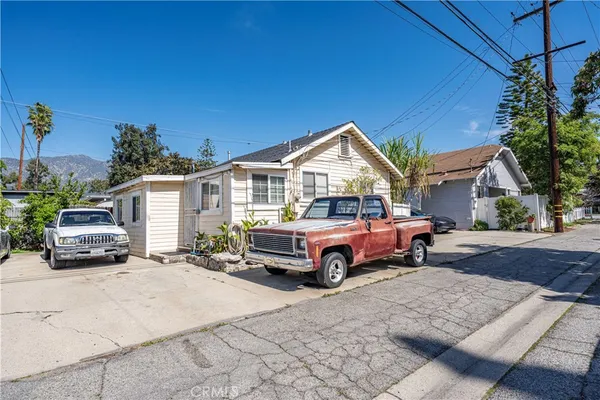 a car parked in front of a house