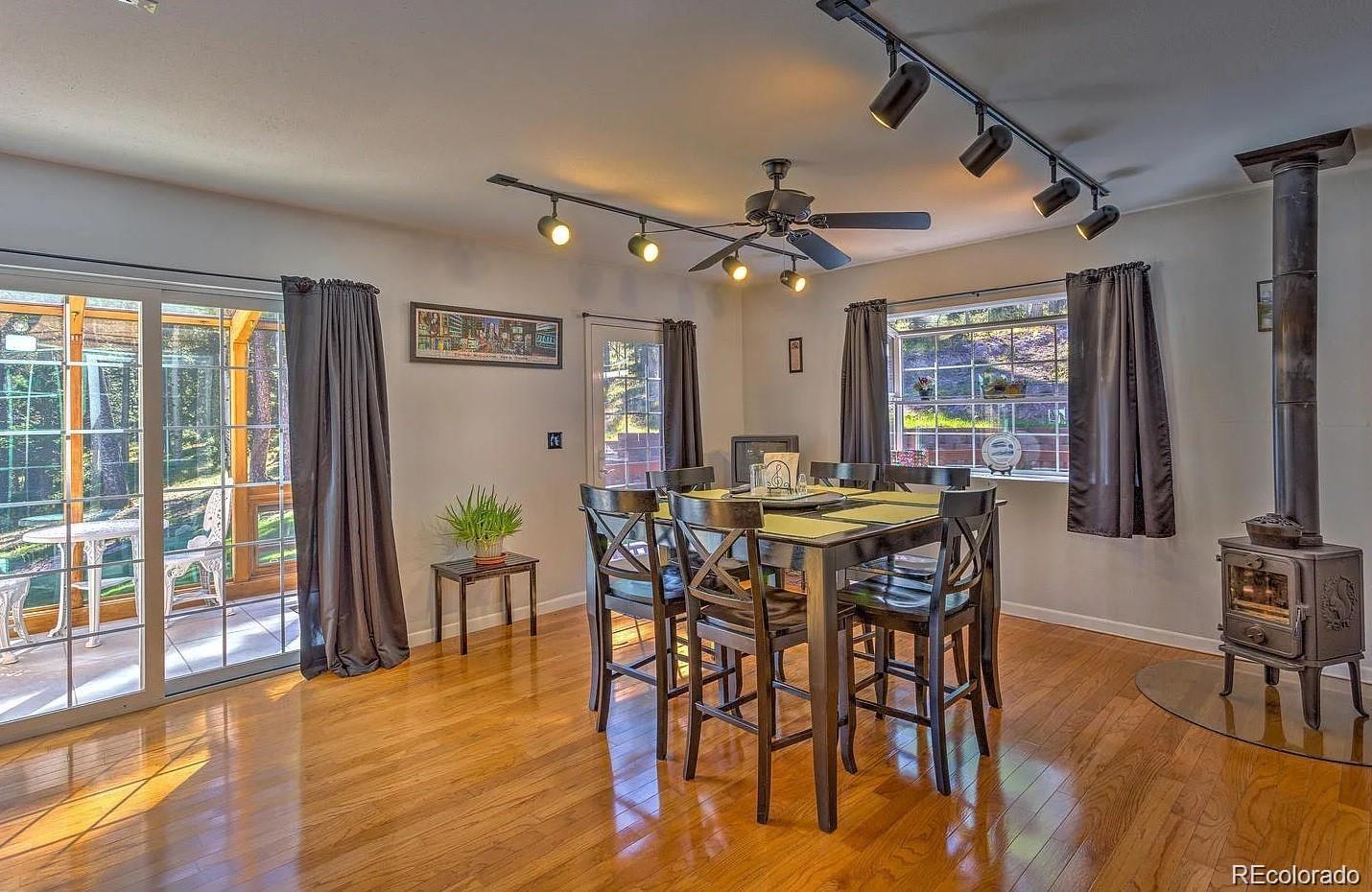 29469 County Road Fort Garland, CO 81133 - Photo 6 of 36 a view of a dining room with furniture window and wooden floor