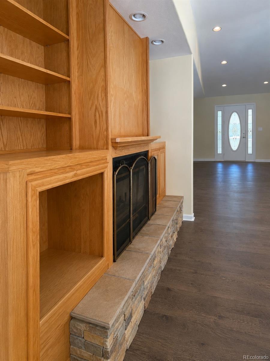 29469 County Road Fort Garland, CO 81133 - Photo 7 of 36 a view of an empty room with a fireplace and a window