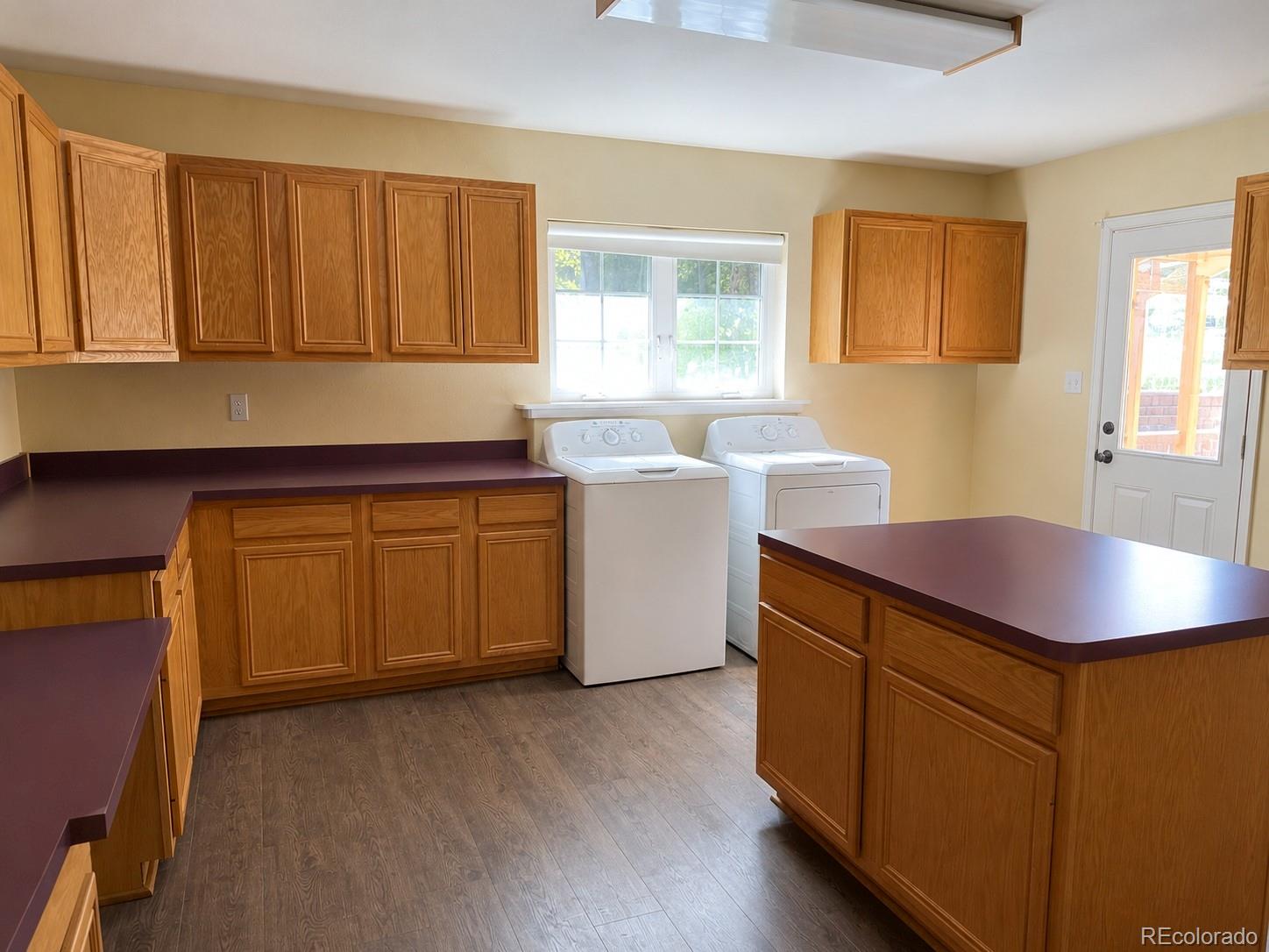 29469 County Road Fort Garland, CO 81133 - Photo 9 of 36 a kitchen with a sink cabinets and window