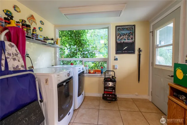 a kitchen with stainless steel appliances a refrigerator and cabinets