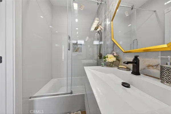 a bathroom with a sink and a tub
