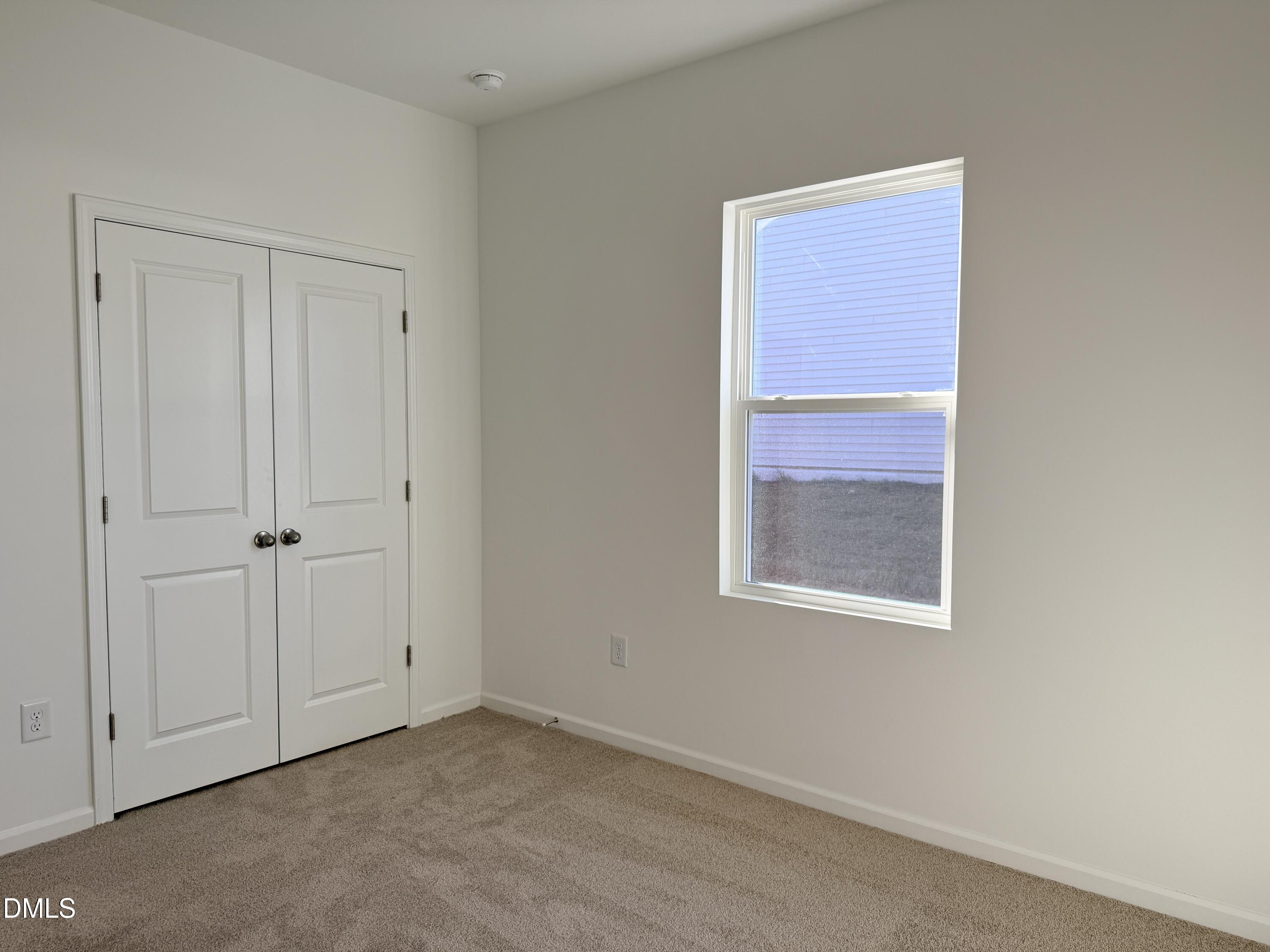 11804 Salers Loop Middlesex, NC 27557 - Photo 25 of 31 a view of an empty room with a window