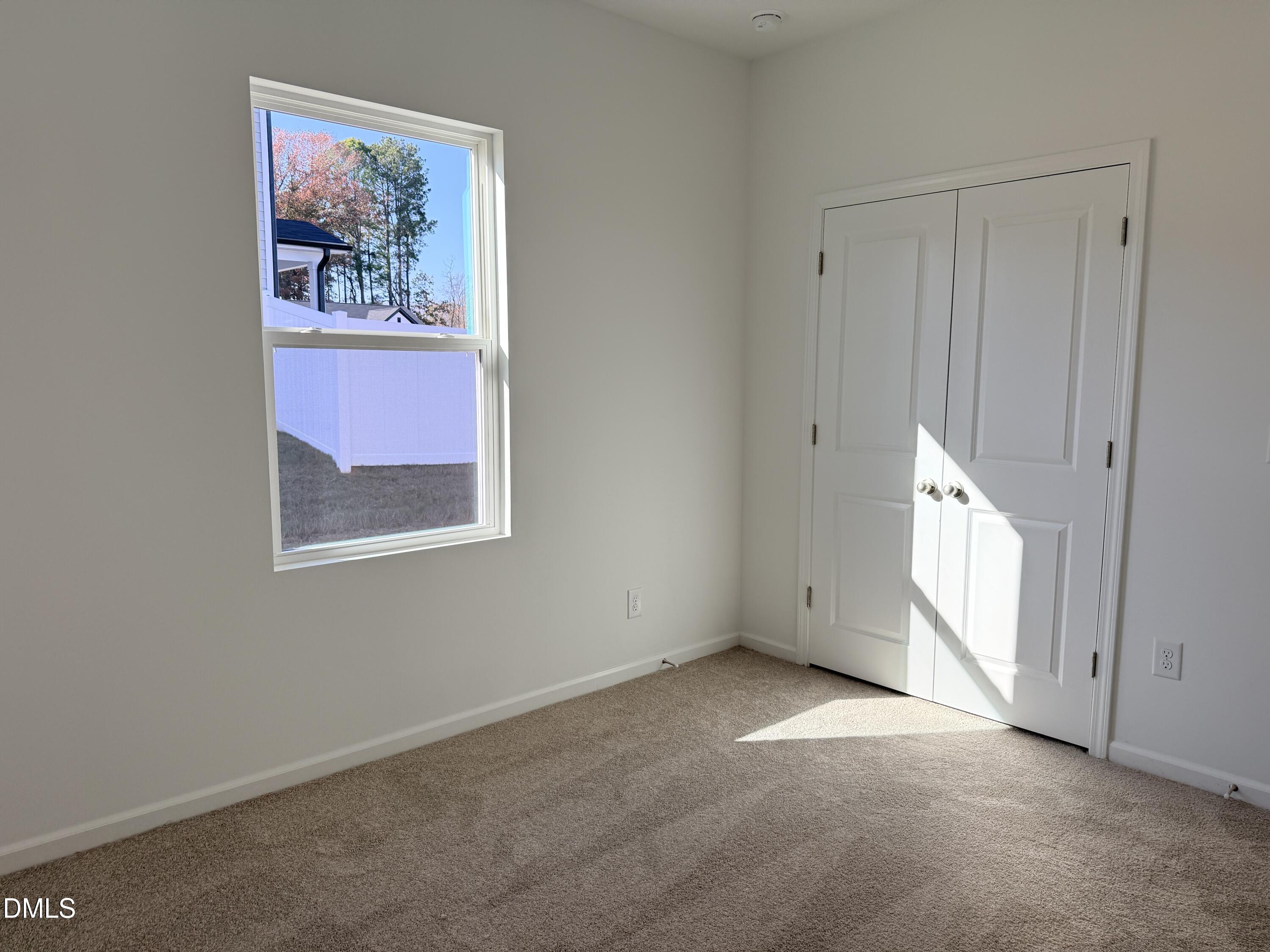 11804 Salers Loop Middlesex, NC 27557 - Photo 29 of 31 a view of an empty room with a window