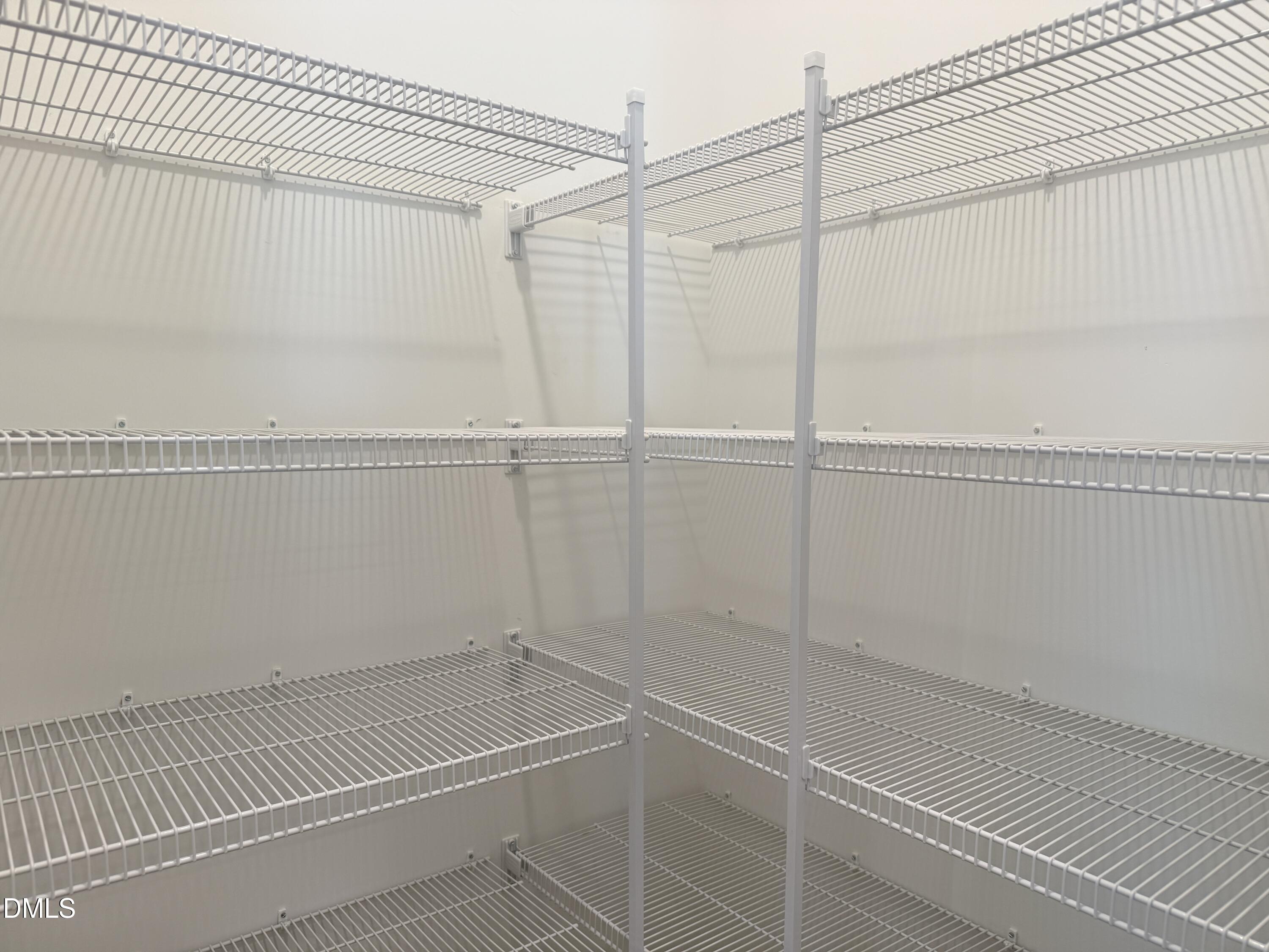 11804 Salers Loop Middlesex, NC 27557 - Photo 10 of 31 a view of a room with racks on the wall