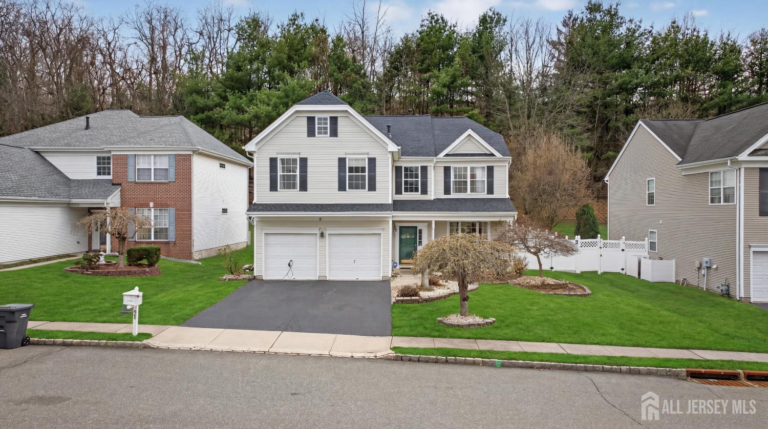 351 Wedgewood Road Morganville, NJ 07751 - Photo 12 of 74 a front view of a house with a yard