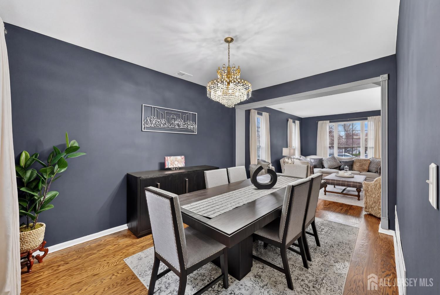 351 Wedgewood Road Morganville, NJ 07751 - Photo 53 of 74 a view of a dining room with furniture window and wooden floor