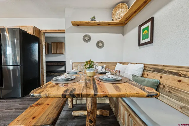 a view of a dining room with furniture