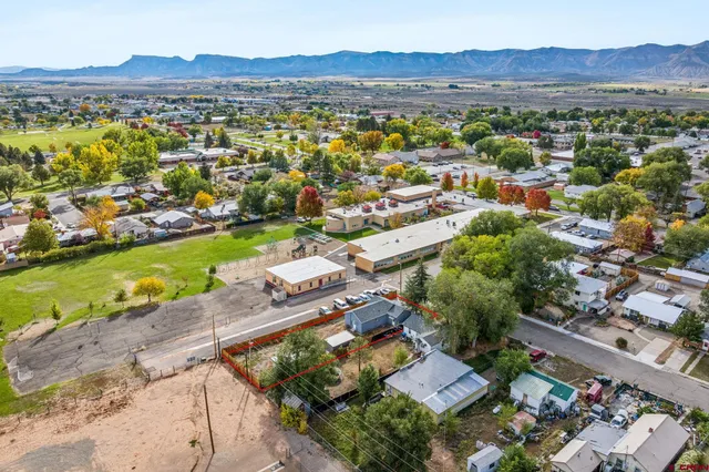 a view of a city with a lake