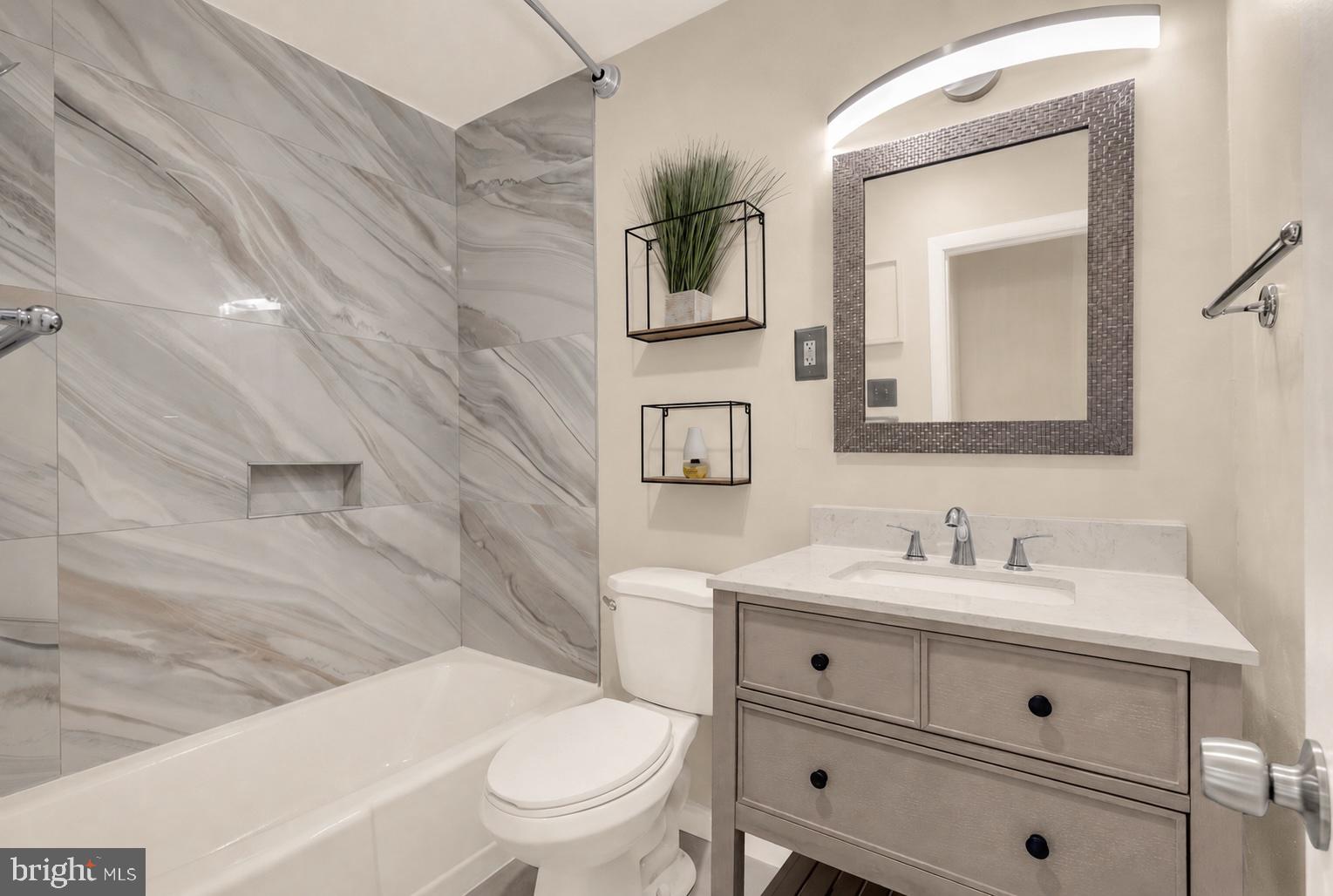 7056 Eastern Avenue Northwest, Unit 107 Washington, DC 20012 - Photo 29 of 36 Newly remodeled bathroom