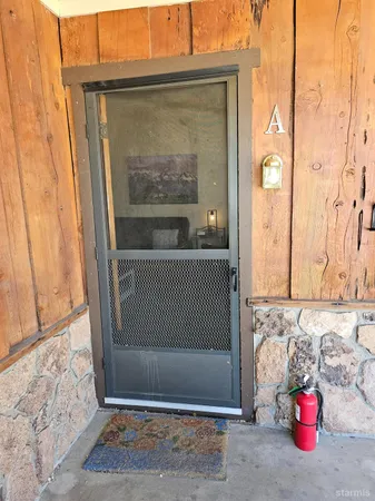 a view of a door and chair