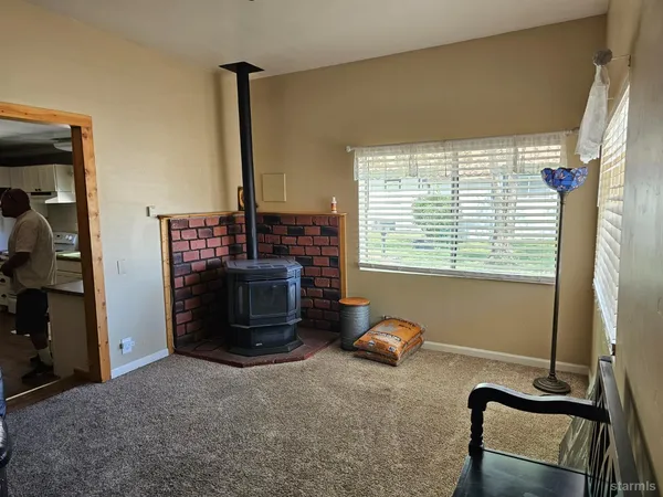 a room with furniture and a window
