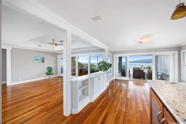 a view of a living room and a fireplace