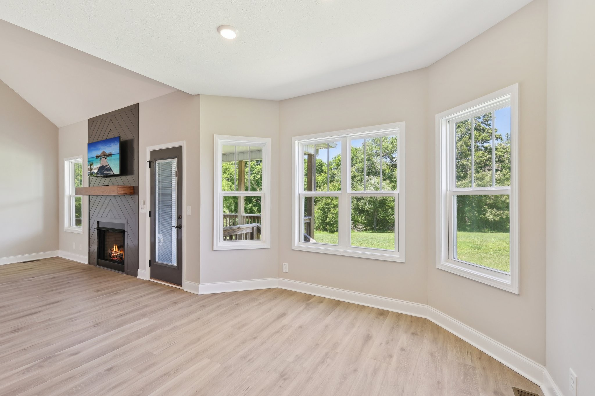 1373 Southside Road Southside, TN 37171 - Photo 14 of 56 wooden floor fireplace and natural light in room