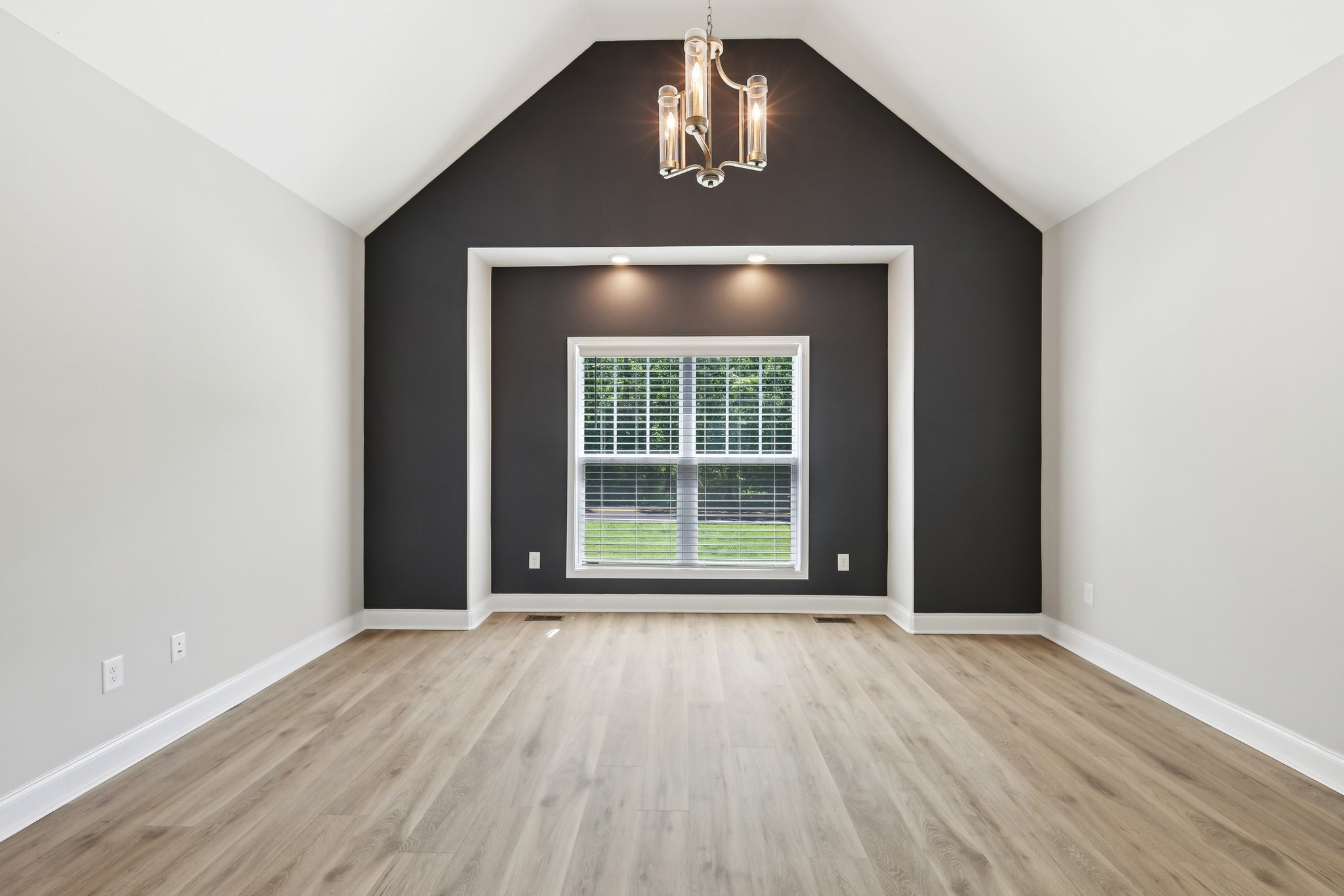 1373 Southside Road Southside, TN 37171 - Photo 21 of 56 an empty room with wooden floor and windows
