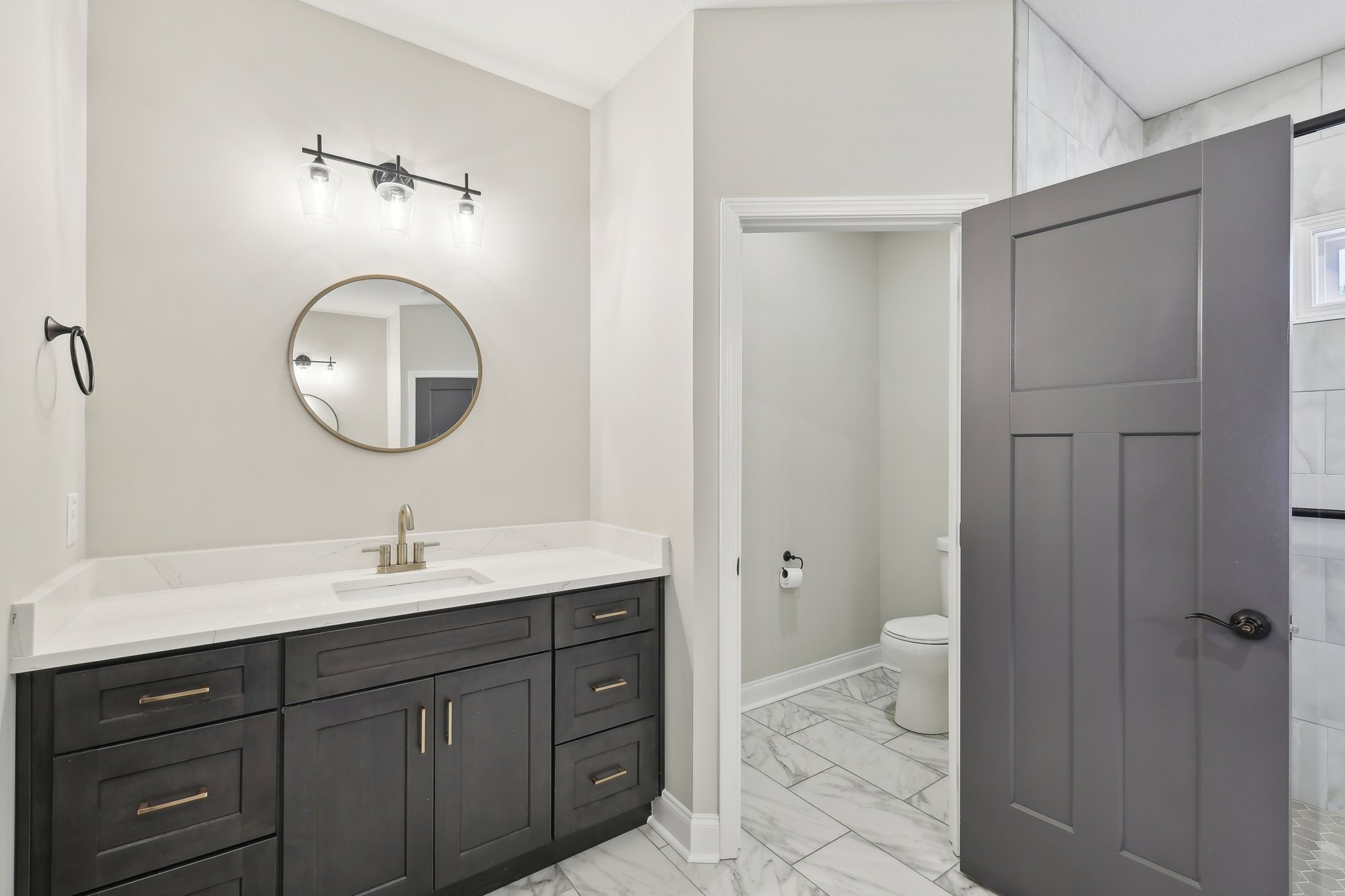 1373 Southside Road Southside, TN 37171 - Photo 26 of 56 a bathroom with a sink a toilet and a mirror