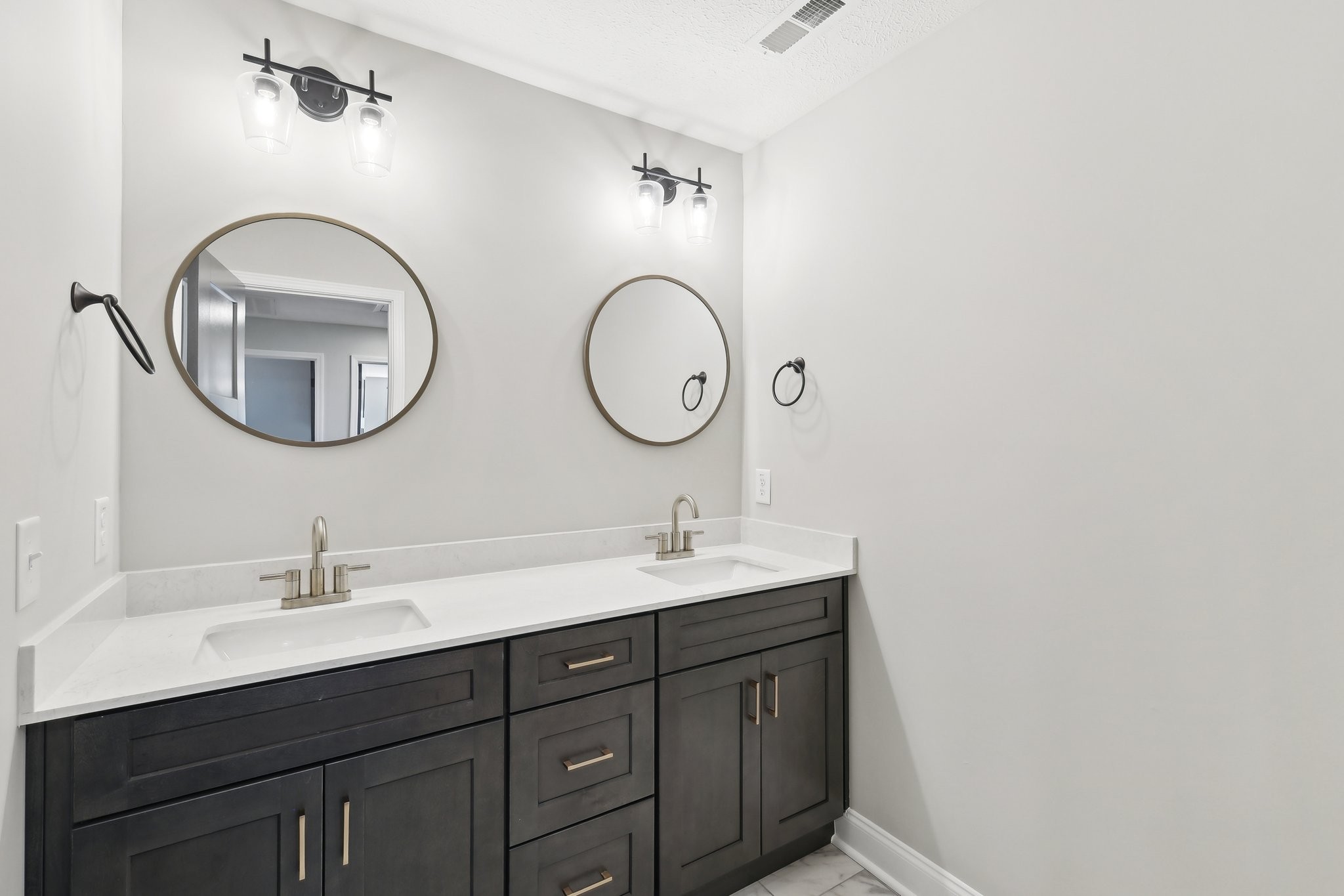 1373 Southside Road Southside, TN 37171 - Photo 41 of 56 a bathroom with a double vanity sink and a mirror