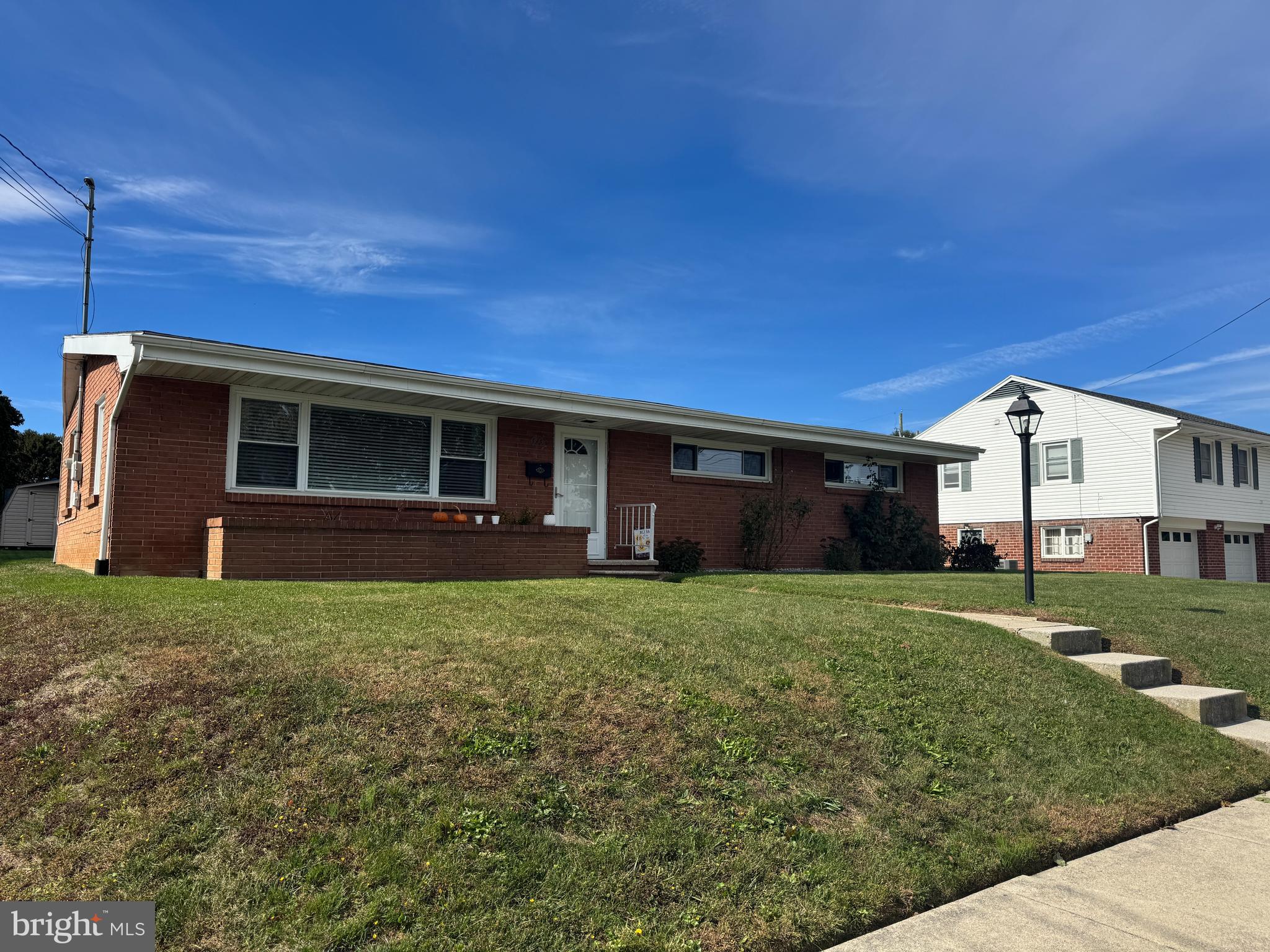 a view of a backyard of the house