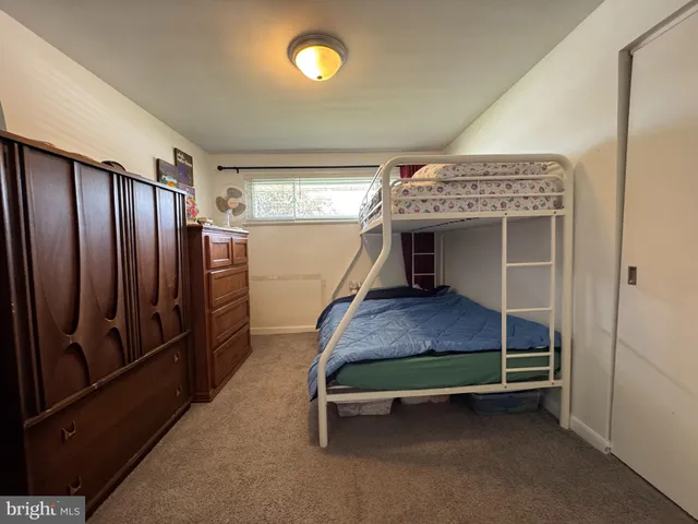 a bedroom with bunk bed