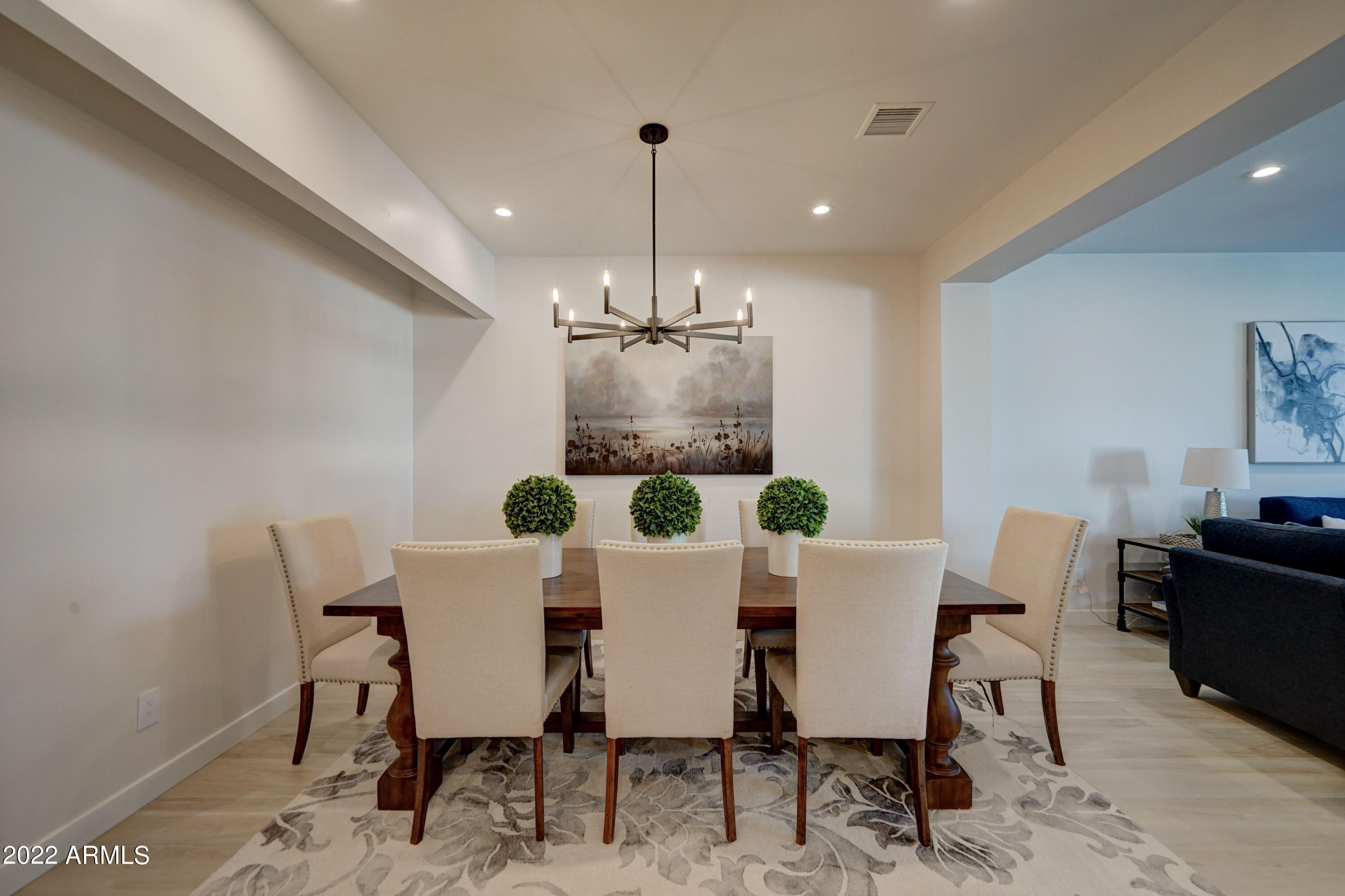 6500 East Camelback Road, Unit 1006 Scottsdale, AZ 85251 - Photo 12 of 38 a view of a dining room with furniture