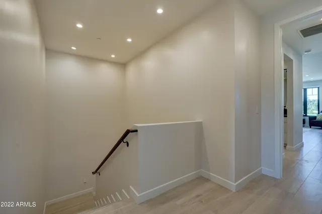 a view of hallway with stairs