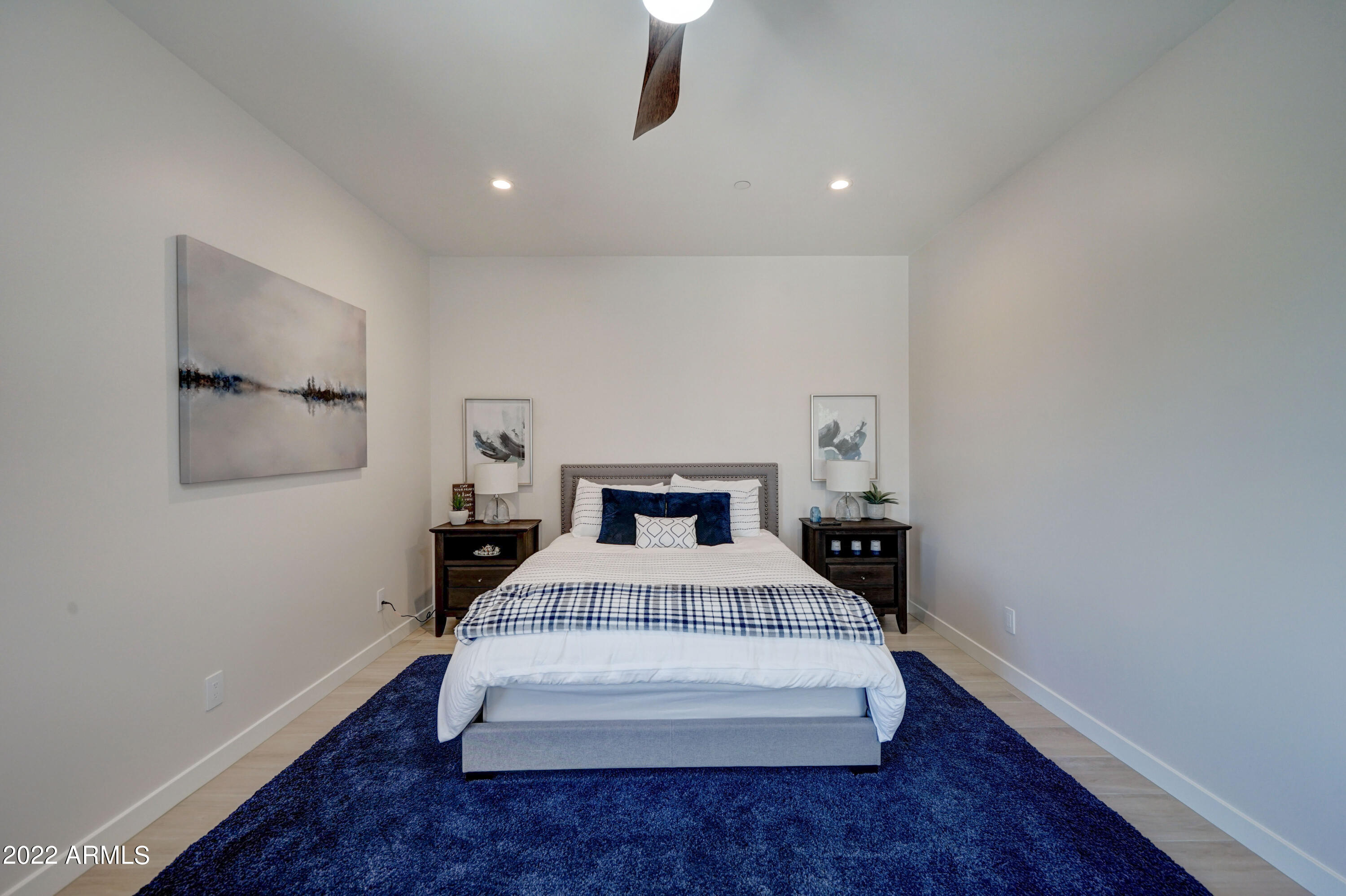 6500 East Camelback Road, Unit 1006 Scottsdale, AZ 85251 - Photo 19 of 38 a bedroom with a bed and window