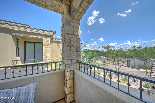 a view of a building from a balcony