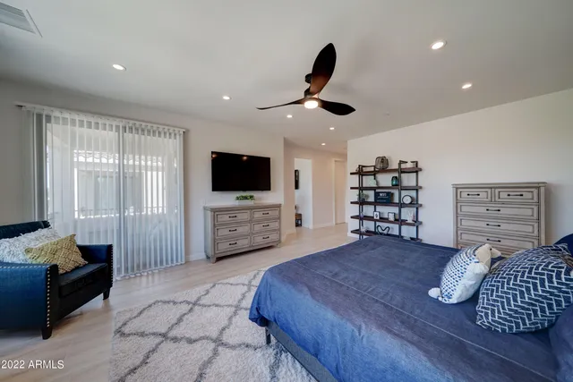 a bedroom with a bed and furniture