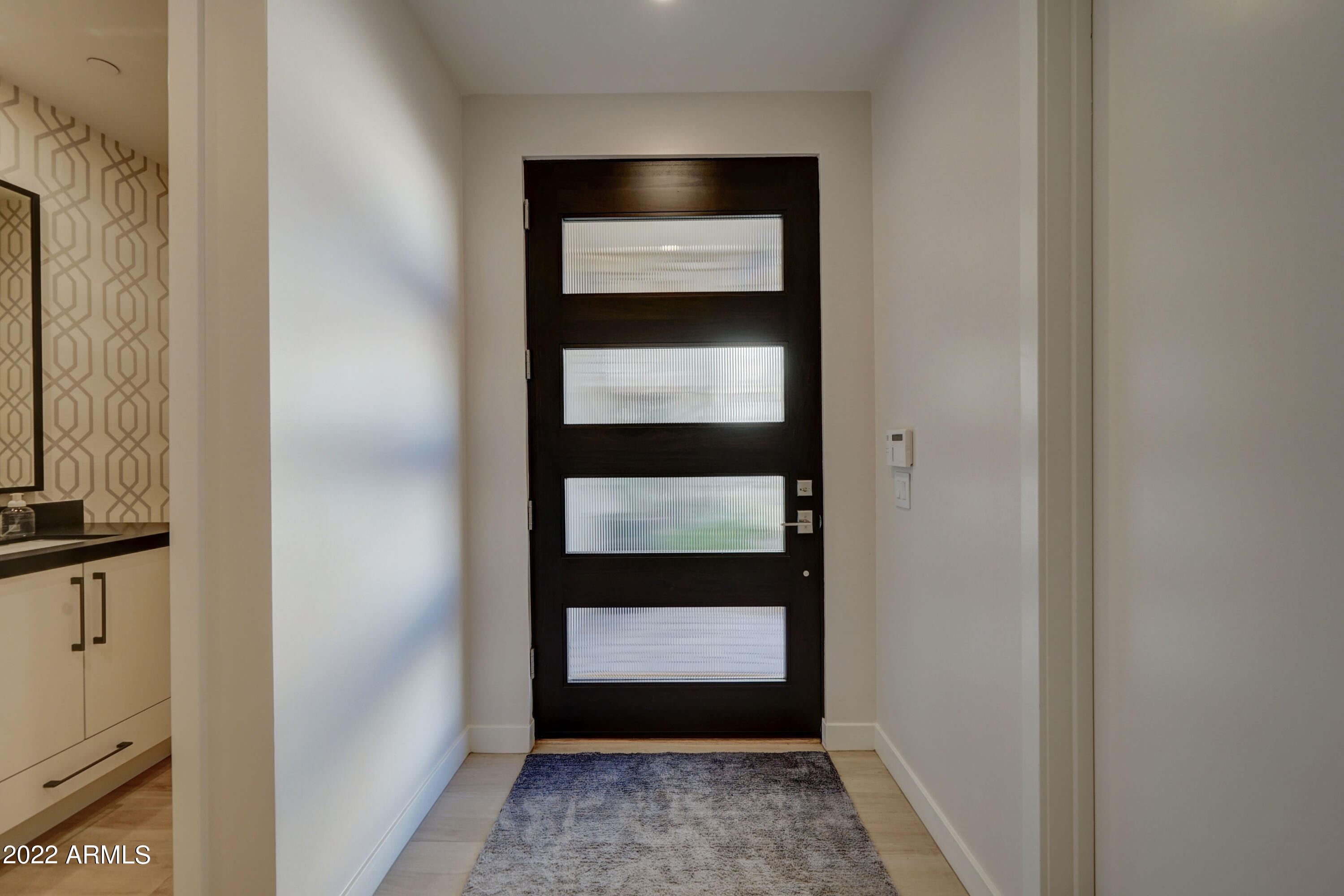 6500 East Camelback Road, Unit 1006 Scottsdale, AZ 85251 - Photo 5 of 38 a view of gallery with wooden floor