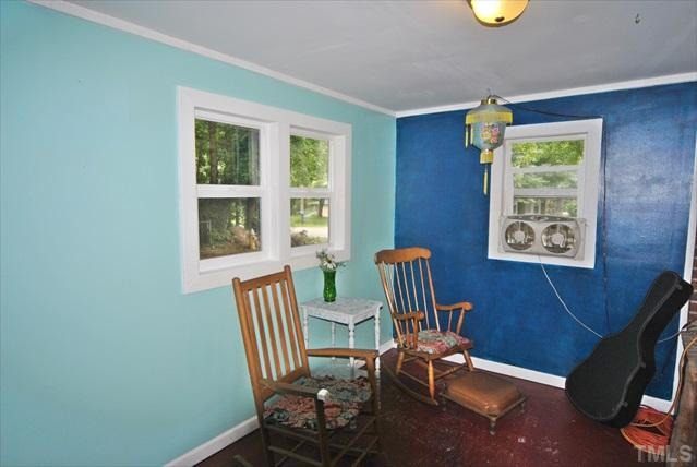 1502 Axum Road Garner, NC 27529 - Photo 14 of 18 Enclosed Front Porch is not included in the square footage but makes a nice 3 Season Room!