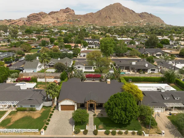 an aerial view of residential houses and city street
