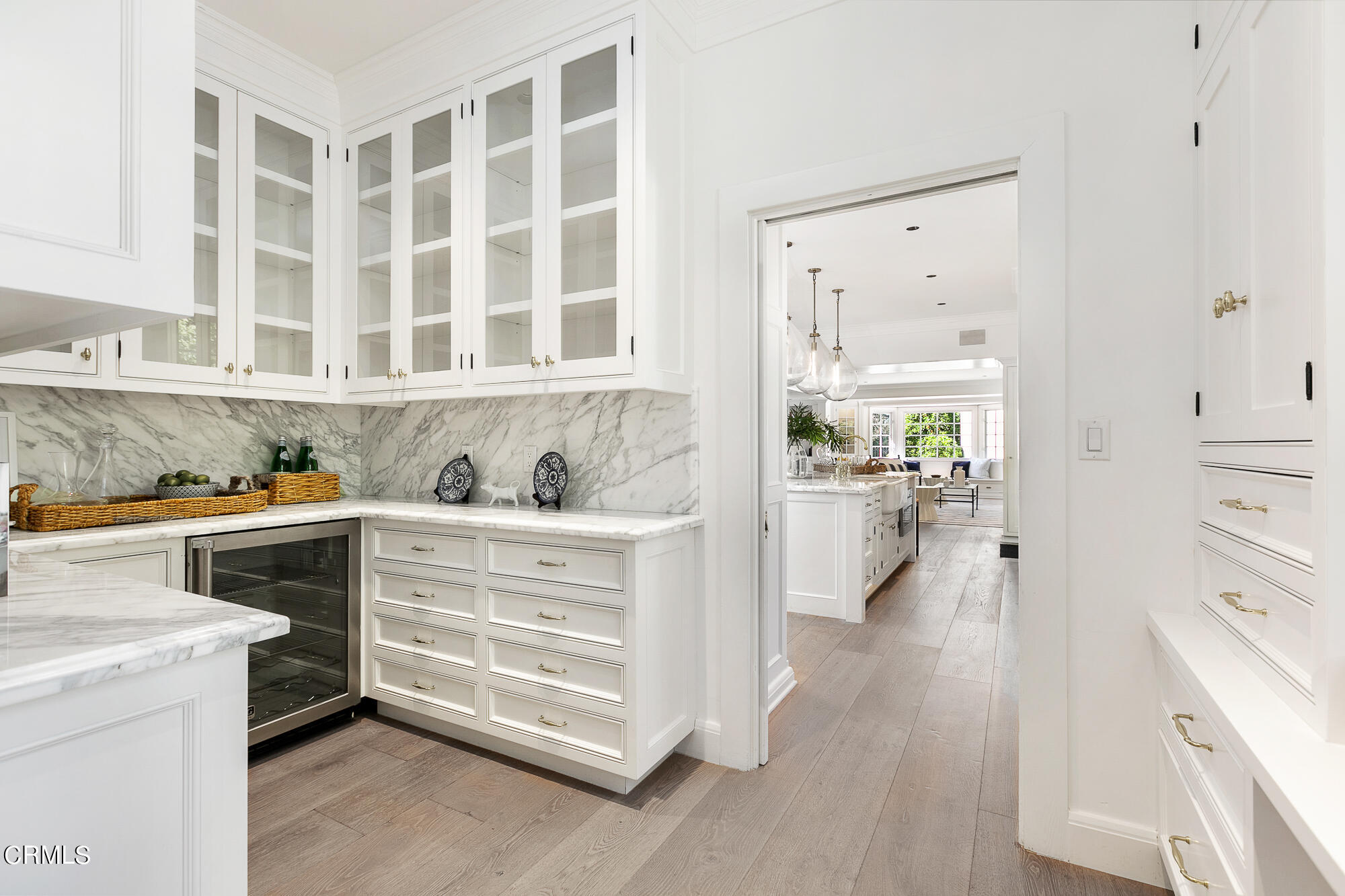 445 Prospect Square Pasadena, CA 91103 - Photo 16 of 55 a view of kitchen with stainless steel appliances cabinets stove and wooden floor