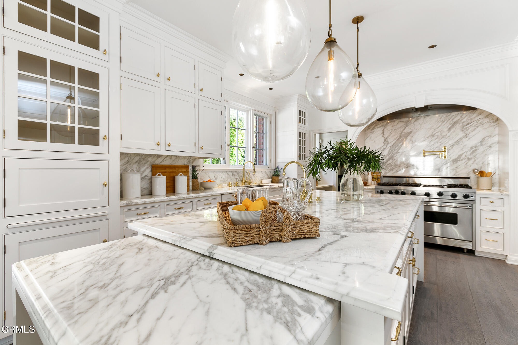 445 Prospect Square Pasadena, CA 91103 - Photo 19 of 55 a kitchen with kitchen island granite countertop a stove and a sink