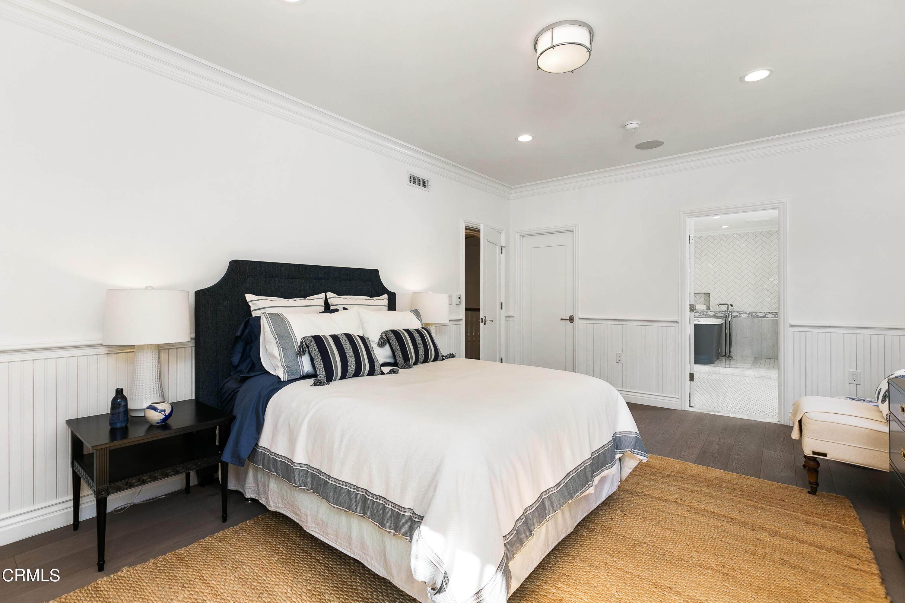 445 Prospect Square Pasadena, CA 91103 - Photo 29 of 55 a spacious bedroom with a bed and a couch