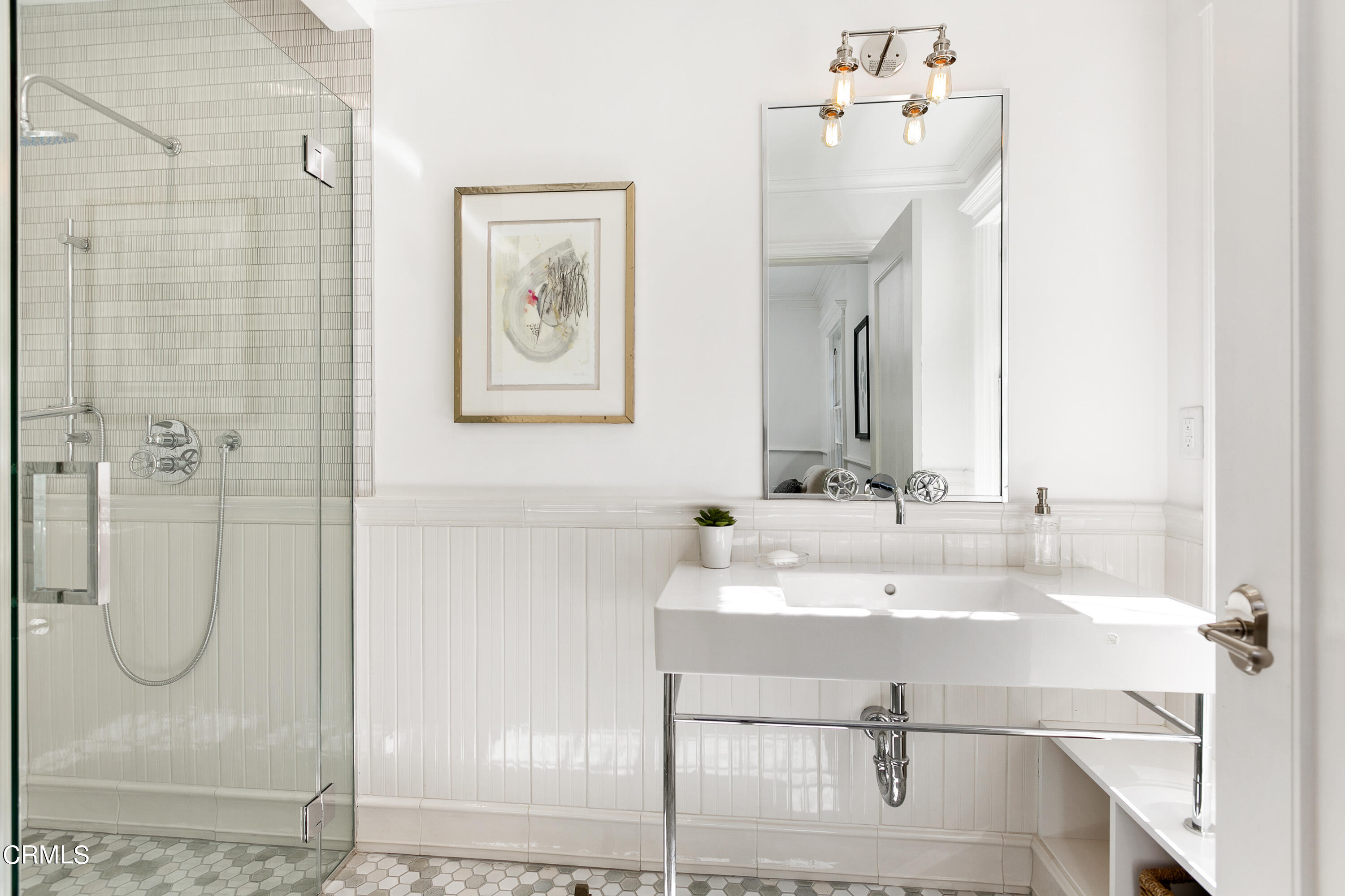 445 Prospect Square Pasadena, CA 91103 - Photo 32 of 55 a bathroom with a granite countertop sink and a mirror