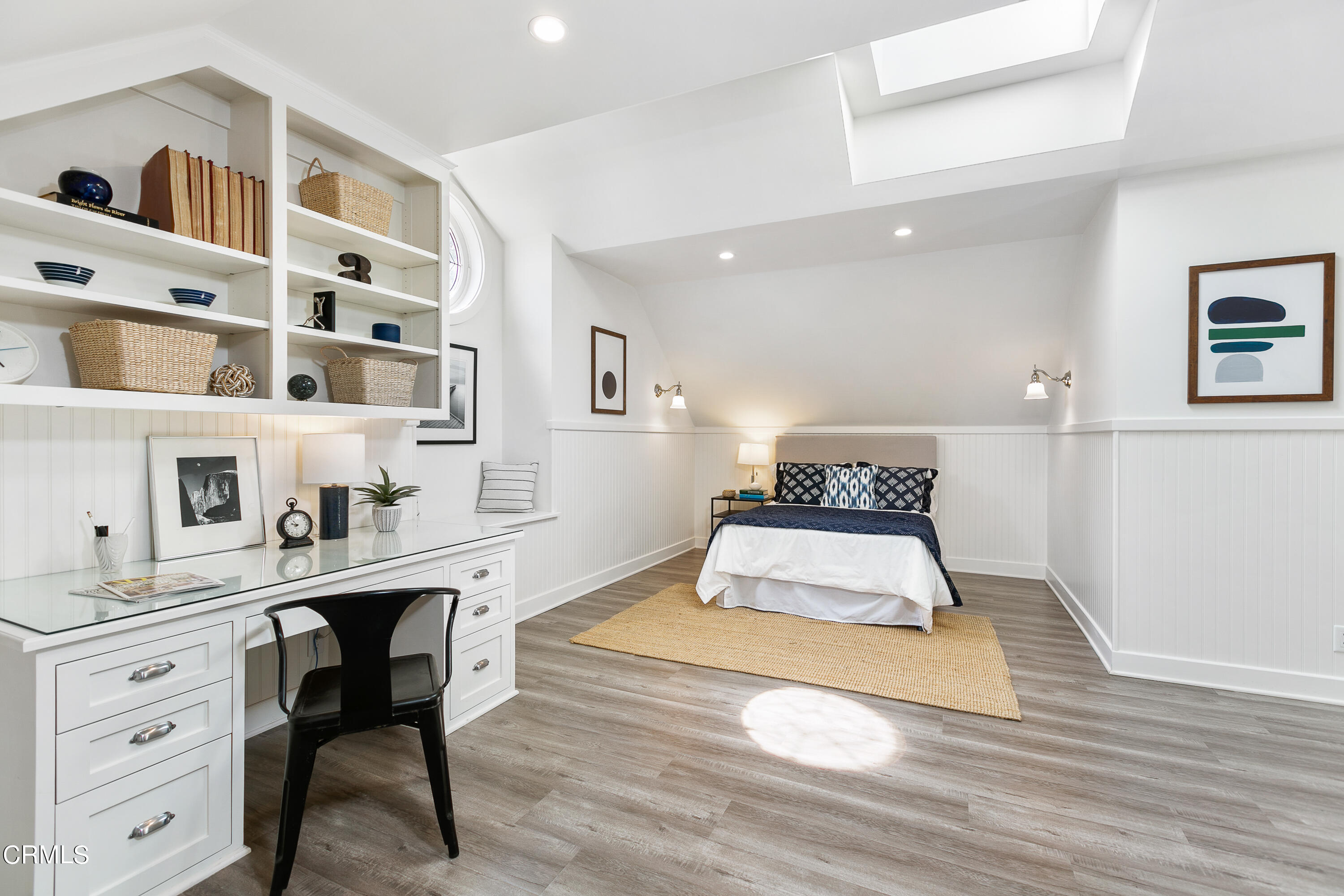 445 Prospect Square Pasadena, CA 91103 - Photo 37 of 55 a spacious bedroom with a bed and a cabinets