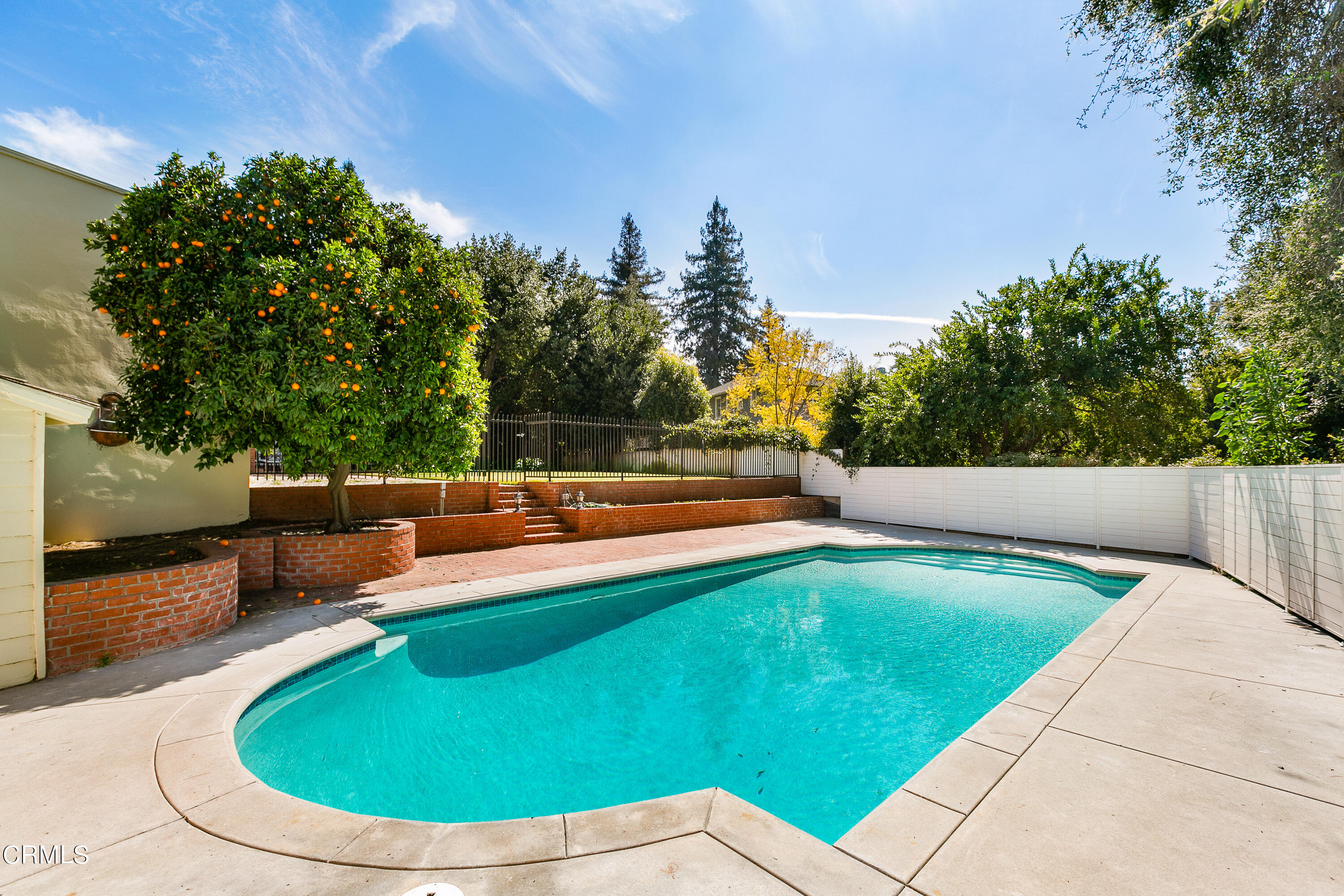 445 Prospect Square Pasadena, CA 91103 - Photo 43 of 55 a view of a swimming pool with a sitting space
