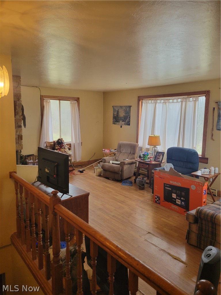 13989 Diagonal Road Salem, OH 44460 - Photo 11 of 18 Living room with hardwood / wood-style floors and a healthy amount of sunlight