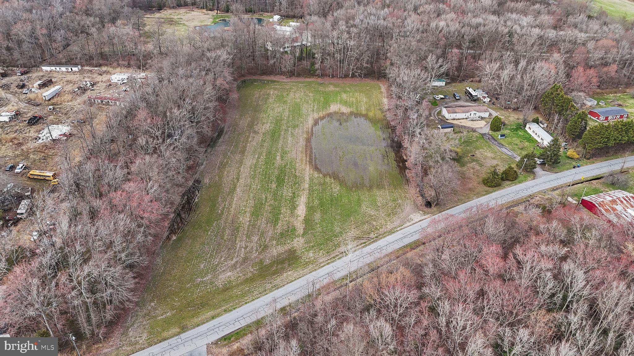 Tbd Downs Chapel Road Clayton, DE 19938 - Photo 5 of 12 Serene landscape with lush greenery.