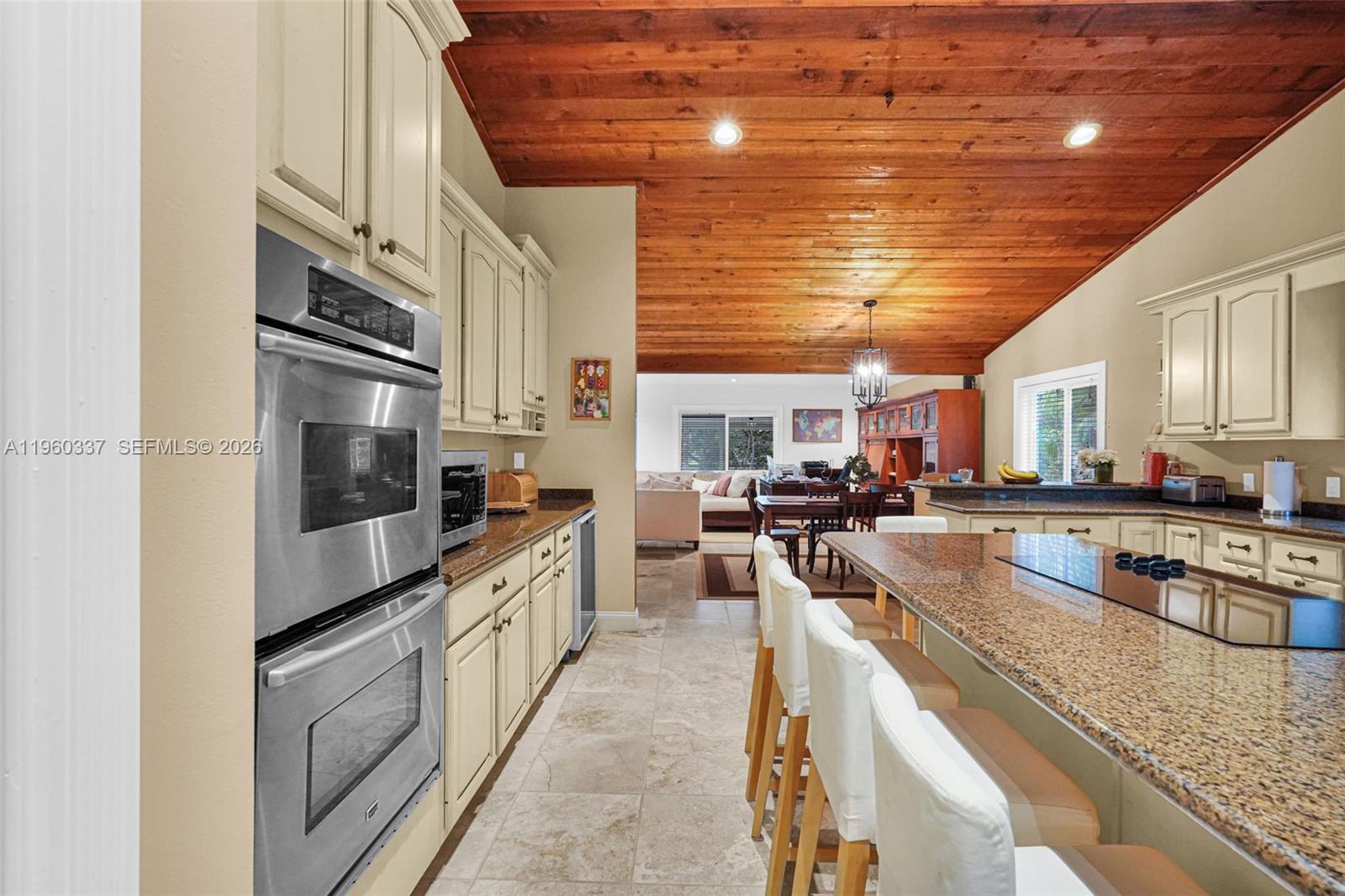 5021 Southwest 168th Avenue Southwest Ranches, FL 33331 - Photo 16 of 88 a large kitchen with stainless steel appliances granite countertop a lot of counter space