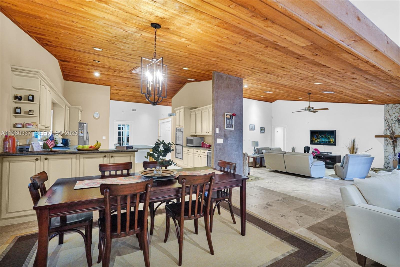 5021 Southwest 168th Avenue Southwest Ranches, FL 33331 - Photo 20 of 88 a view of a dining room with furniture
