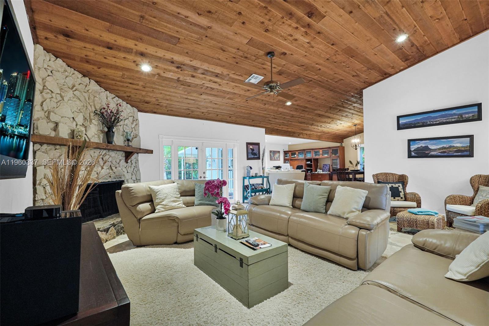 5021 Southwest 168th Avenue Southwest Ranches, FL 33331 - Photo 24 of 88 a living room with furniture and a fireplace