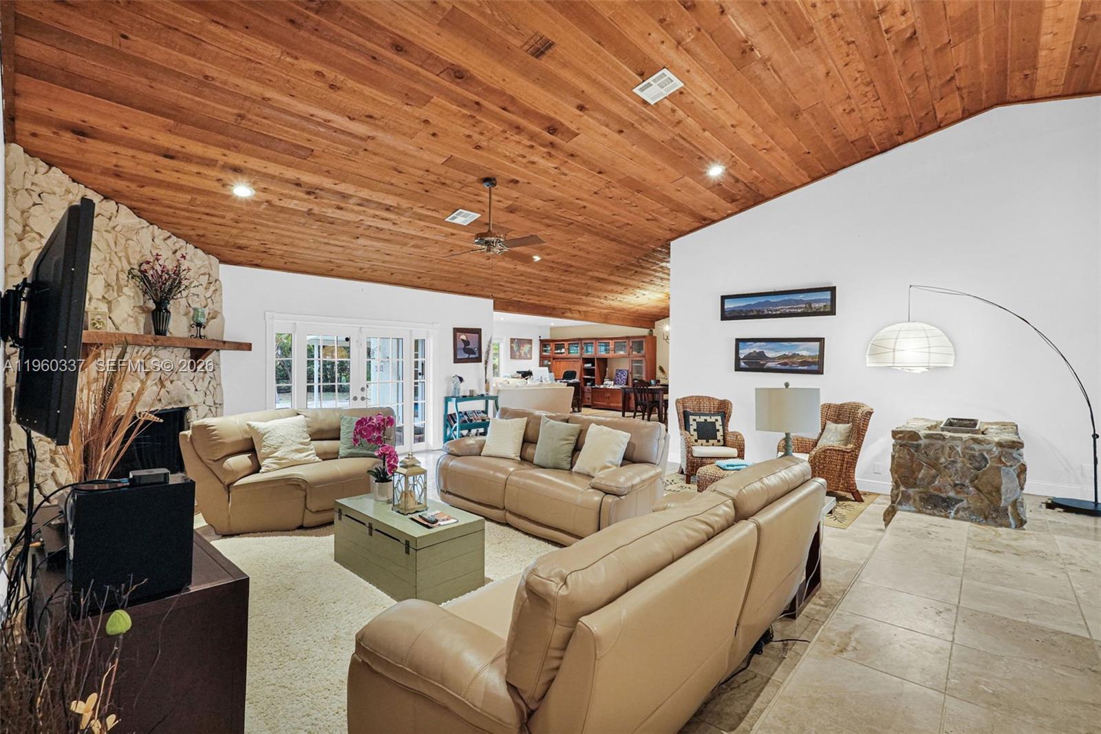 5021 Southwest 168th Avenue Southwest Ranches, FL 33331 - Photo 25 of 88 a living room with furniture and a flat screen tv