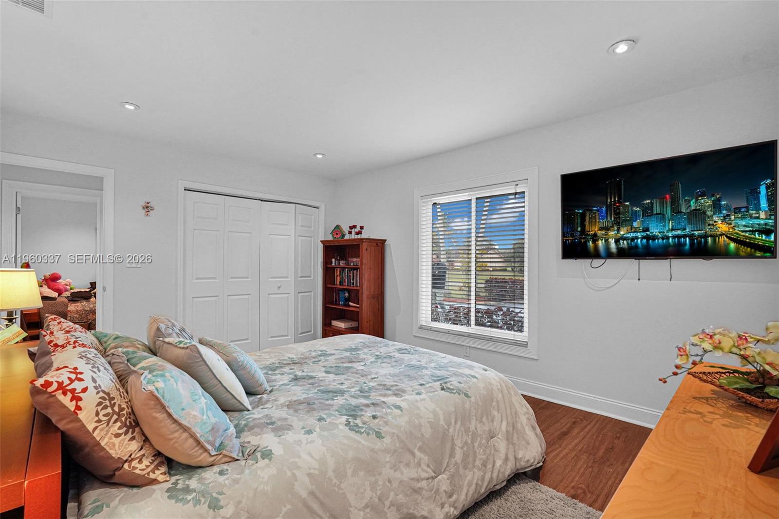 5021 Southwest 168th Avenue Southwest Ranches, FL 33331 - Photo 45 of 88 a bedroom with a bed and a flat screen tv