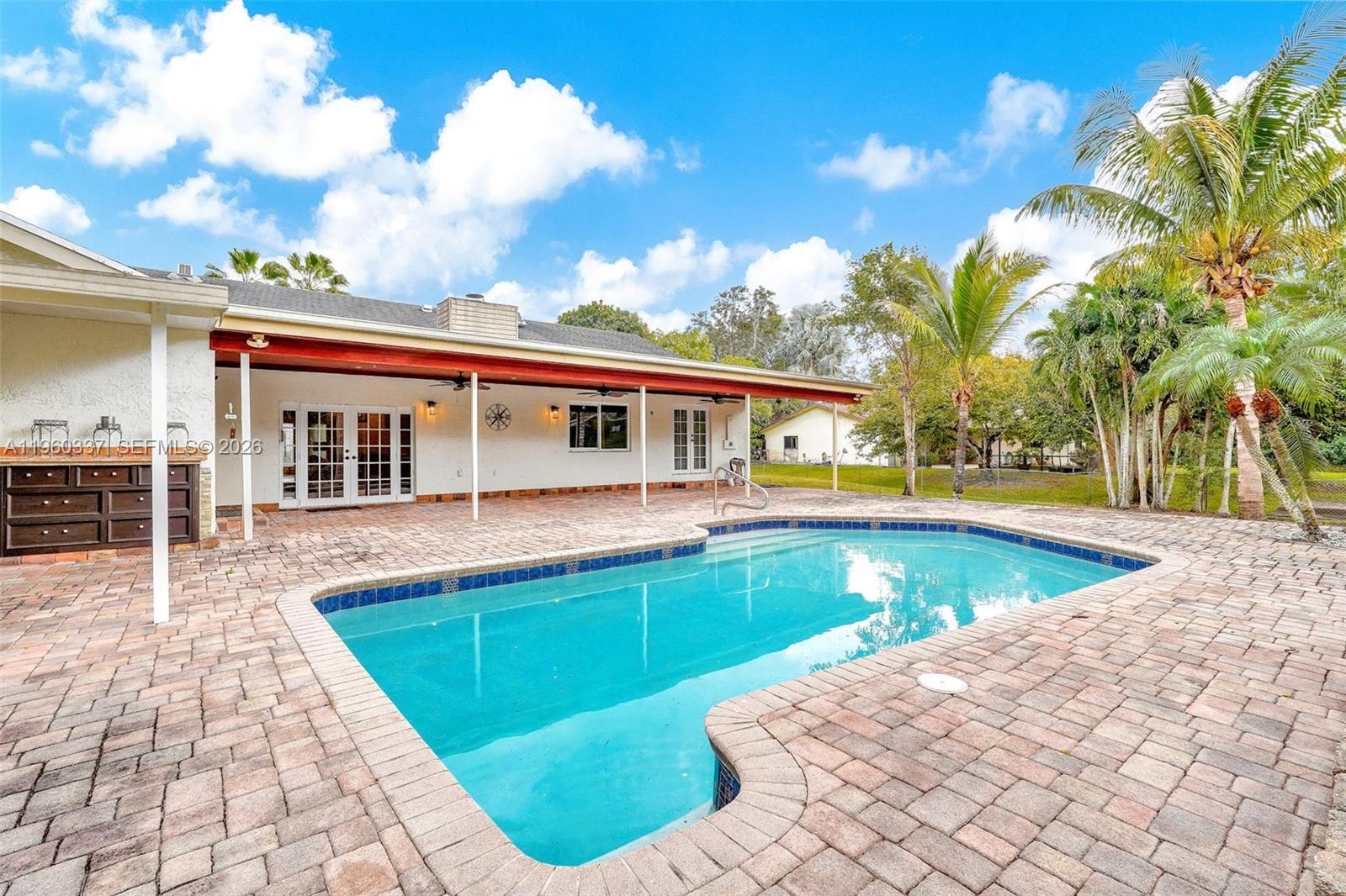 5021 Southwest 168th Avenue Southwest Ranches, FL 33331 - Photo 69 of 88 a view of a house with swimming pool