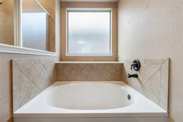 a bathroom with a bathtub