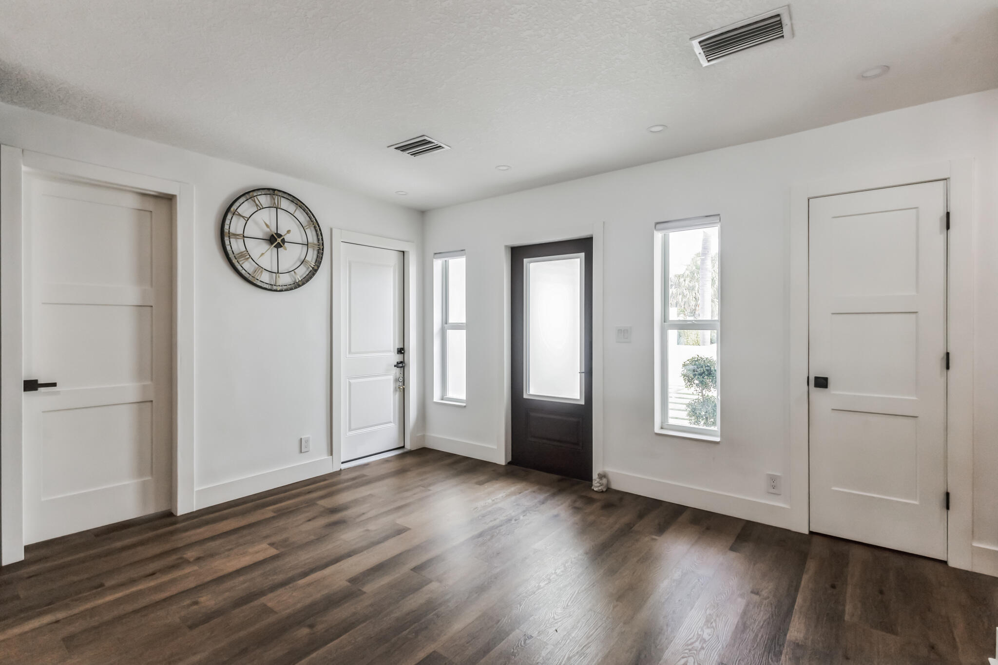 226 Bamboo Road Palm Beach Shores, FL 33404 - Photo 4 of 39 a view of a room with wooden floor