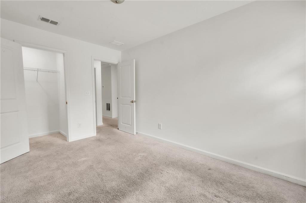 1517 Vernon Boulevard Decatur, GA 30035 - Photo 15 of 25 a view of an empty room