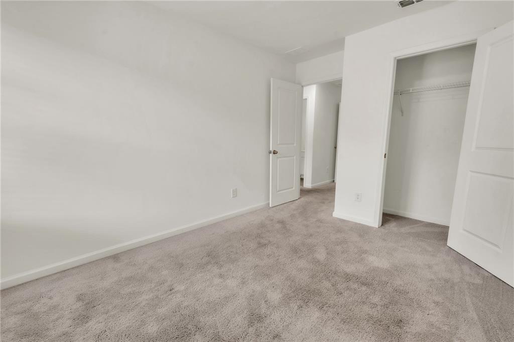 1517 Vernon Boulevard Decatur, GA 30035 - Photo 16 of 25 a view of an empty room and entryway